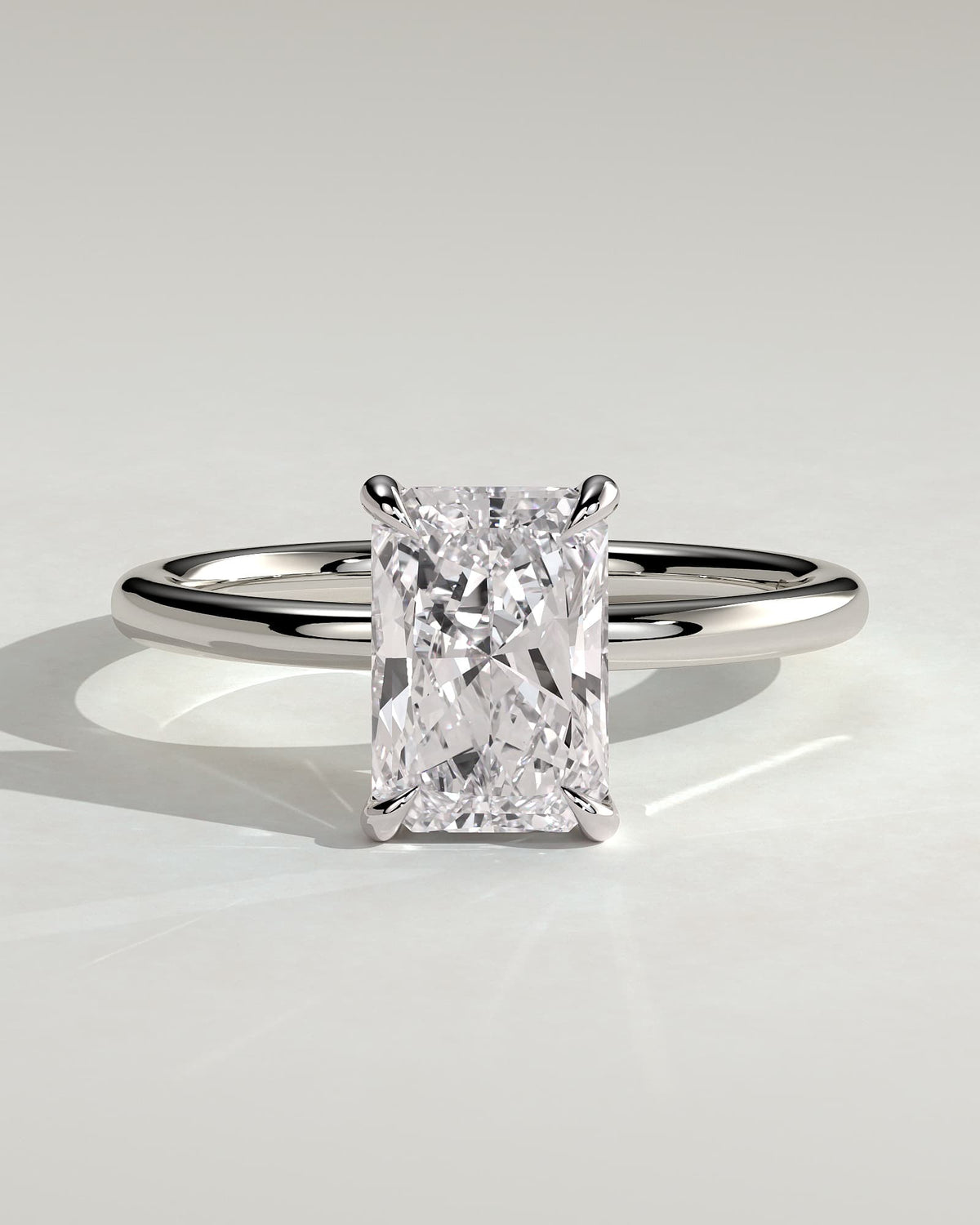 Judy - Radiant Claw Solitaire Engagement Ring - Platinum