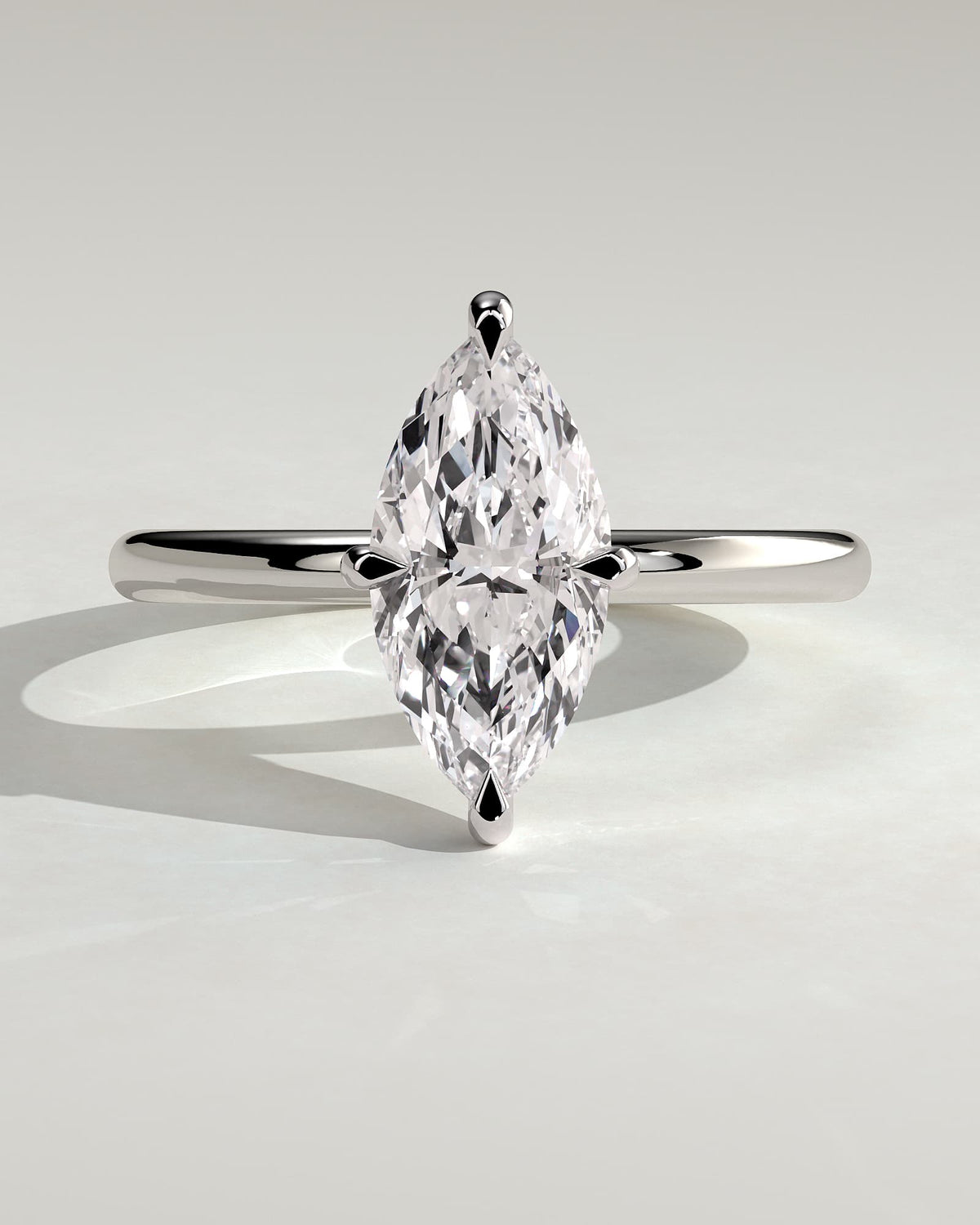 Genevieve - Marquise Claw Solitaire Engagement Ring - White Gold