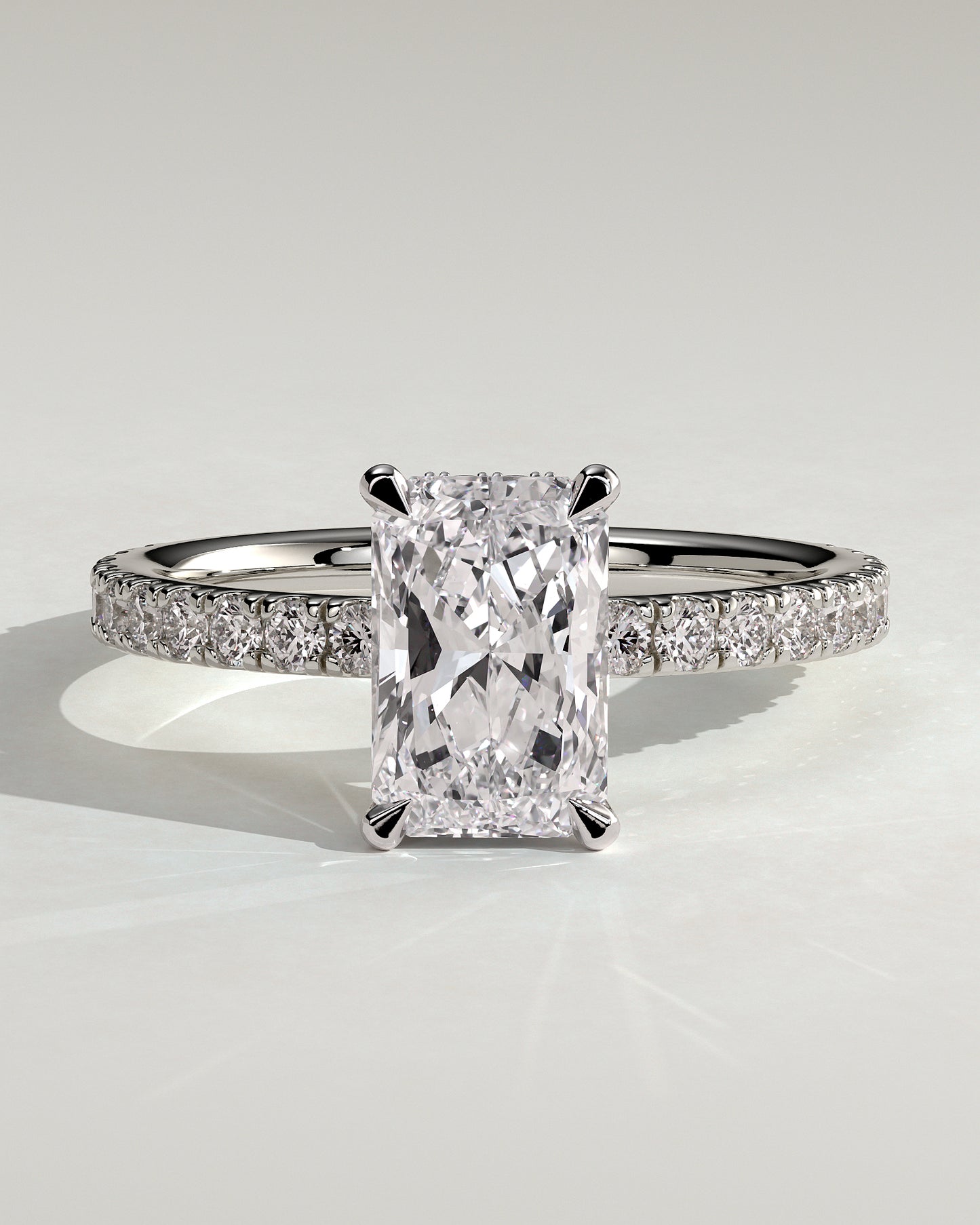 Ellie - Radiant Claw Solitaire with Wrap Around Hidden Halo and Pave Band Engagement Ring - Platinum - White Gold / Platinum 2ct