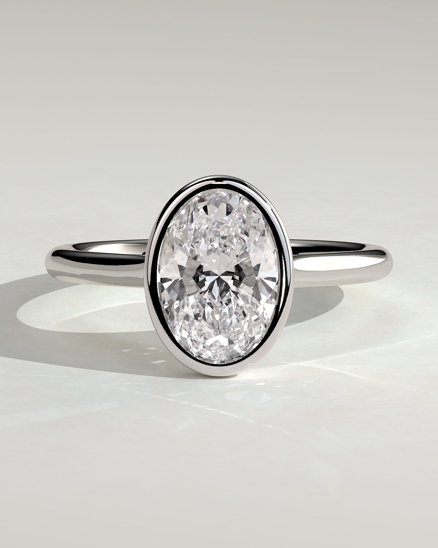 Daphne - Oval Bezel Solitaire with Cathedral High Setting Engagement Ring - White Gold