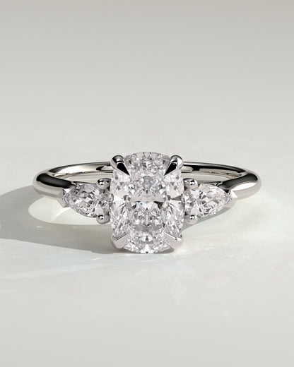 Cataleya - Elongated Cushion Claw Trilogy with Pear Side Stones and Cathedral Setting Engagement Ring - White Gold