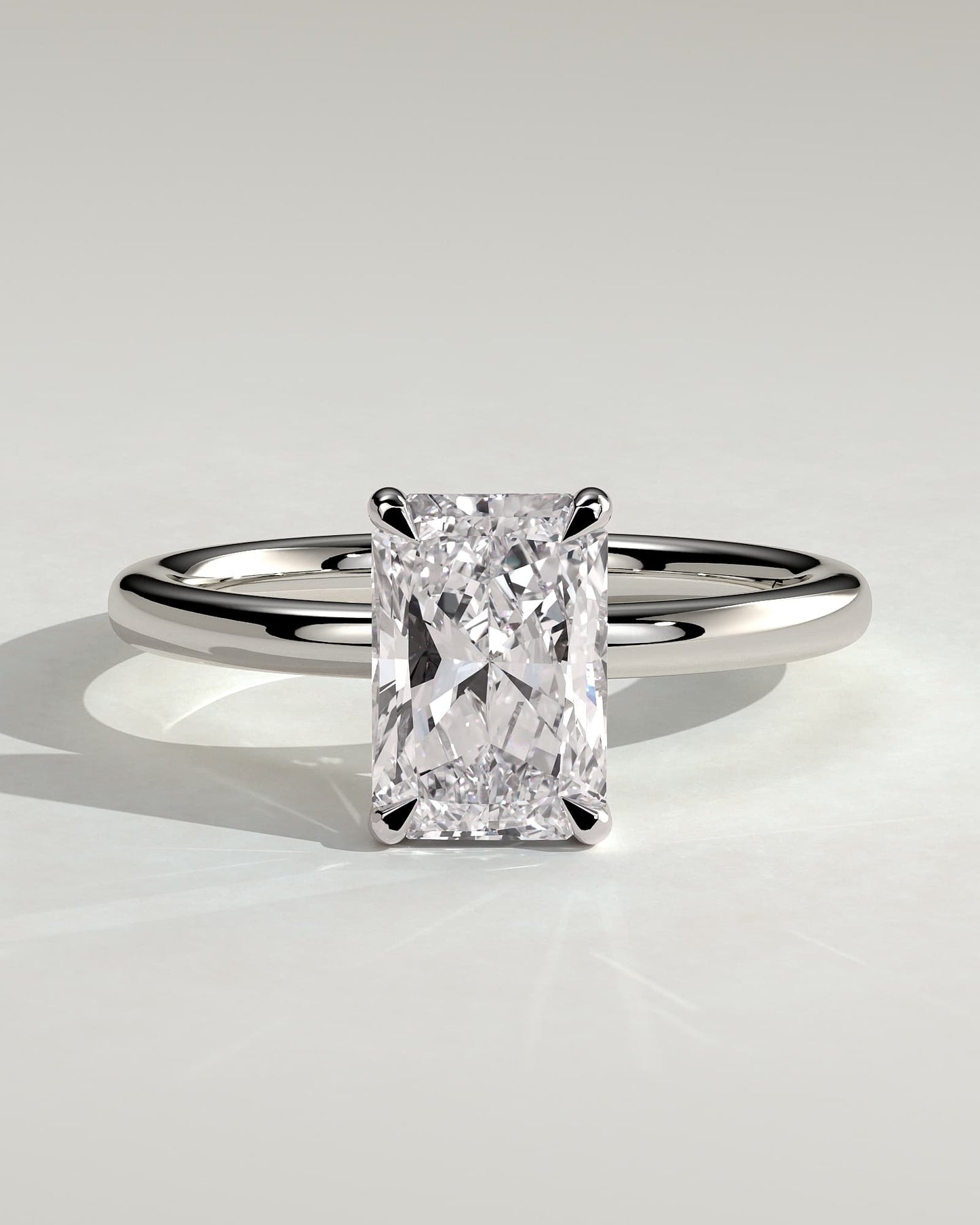 Carly - Radiant Claw Solitaire with Hidden Halo Engagement Ring - White Gold