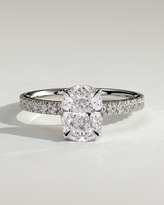 Camilla - Elongated Cushion Claw Solitaire with Hidden Halo and Pave Band Engagement Ring - White Gold