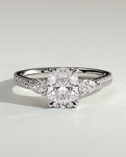 Bree - Elongated Cushion Claw Trilogy with Pear Side Stones and Pave Band Engagement Ring - White Gold