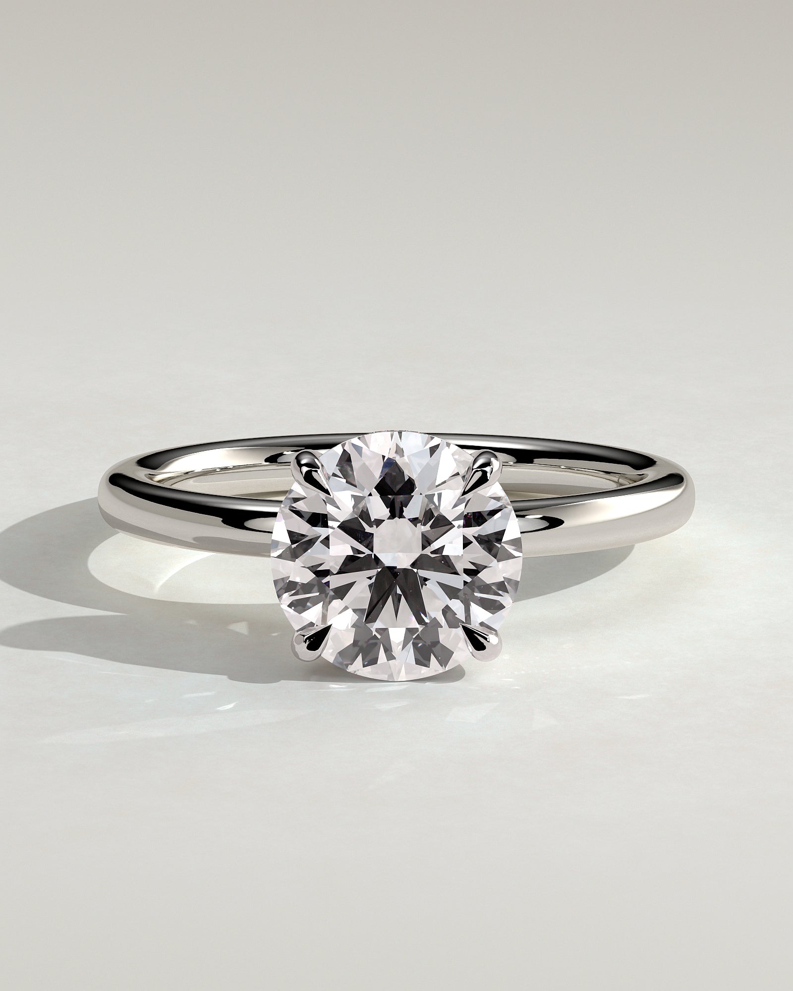 Bindi - Round Claw Solitaire with Hidden Halo Engagement Ring - Platinum - White Gold / Platinum 2ct