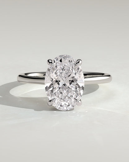 Bethany - Oval Claw Solitaire with Hidden Halo, Tapered Band and Cathedral High Setting Engagement Ring - Platinum