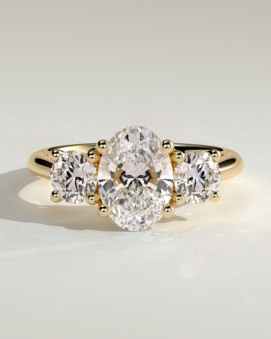 Grace - Oval Claw Trilogy with Round Side Stones, Open Trellis Gallery and Tapered Band Engagement Ring - Yellow Gold - Yellow Gold 2ct