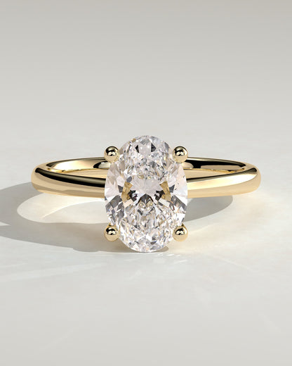 Emily - Oval Claw Solitaire with Pinched Tapered Band and Cathedral Low Setting Engagement Ring - Yellow Gold