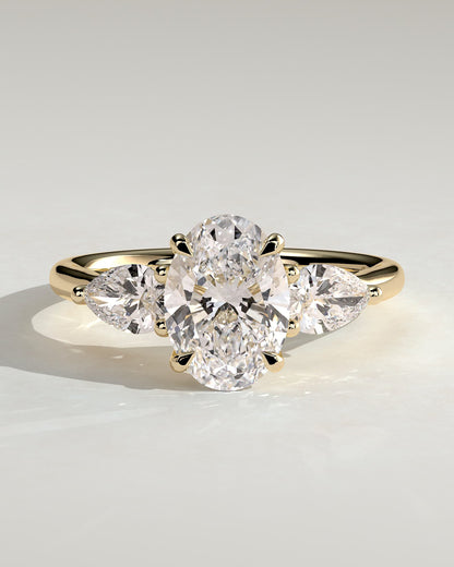 Amara - Oval Claw Trilogy with Pear Side Stones and Open Trellis Gallery Engagement Ring - Yellow Gold - yellow gold - Lara Jewels