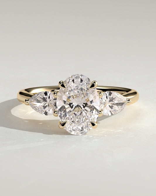Amara - Oval Claw Trilogy with Pear Side Stones and Open Trellis Gallery Engagement Ring - Yellow Gold - Yellow Gold 2ct