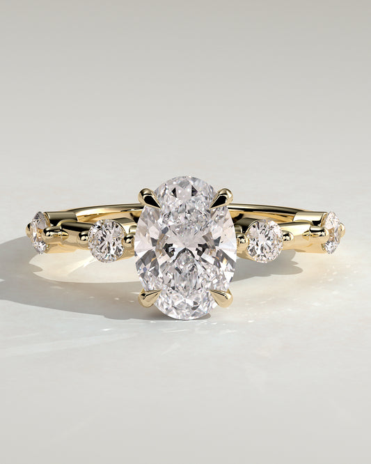 Arwen - Oval Claw Solitaire with 4 Spaced Round Accent Stones and Hidden Halo Engagement Ring - Yellow Gold - Yellow Gold 2ct