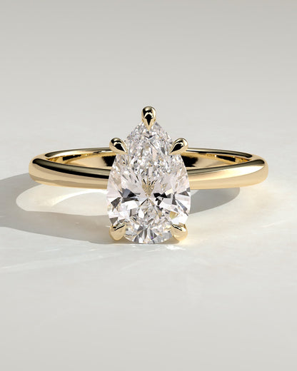Aspen - Pear Claw Solitaire with Pinched Tapered Band and Cathedral Low Setting Engagement Ring - Yellow Gold