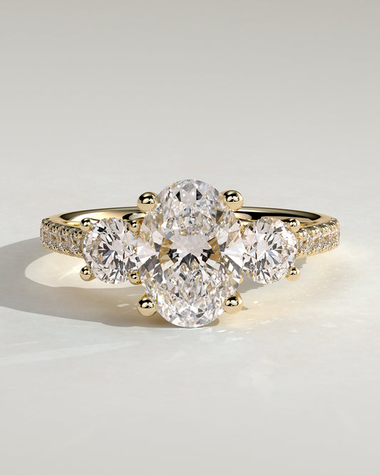 Aviana - Oval Claw Trilogy with Round Side Stones, Pave Band and Trellis Gallery  Engagement Ring - Yellow Gold - Yellow Gold 2ct
