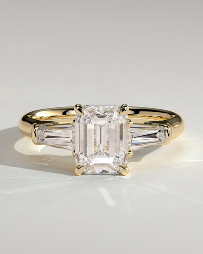 Bridget - Emerald Claw Trilogy with Tapered Baguette Side Stones and Cathedral Setting Engagement Ring - Yellow Gold