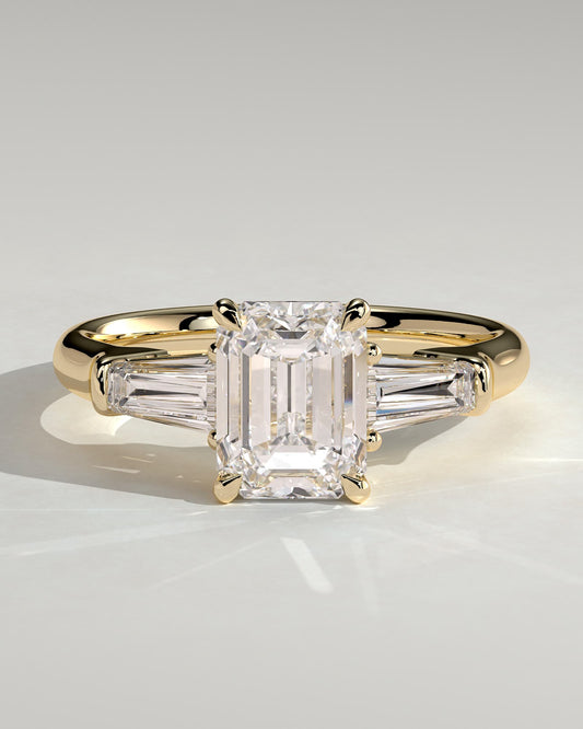 Bridget - Emerald Claw Trilogy with Tapered Baguette Side Stones and Cathedral Setting Engagement Ring - Yellow Gold