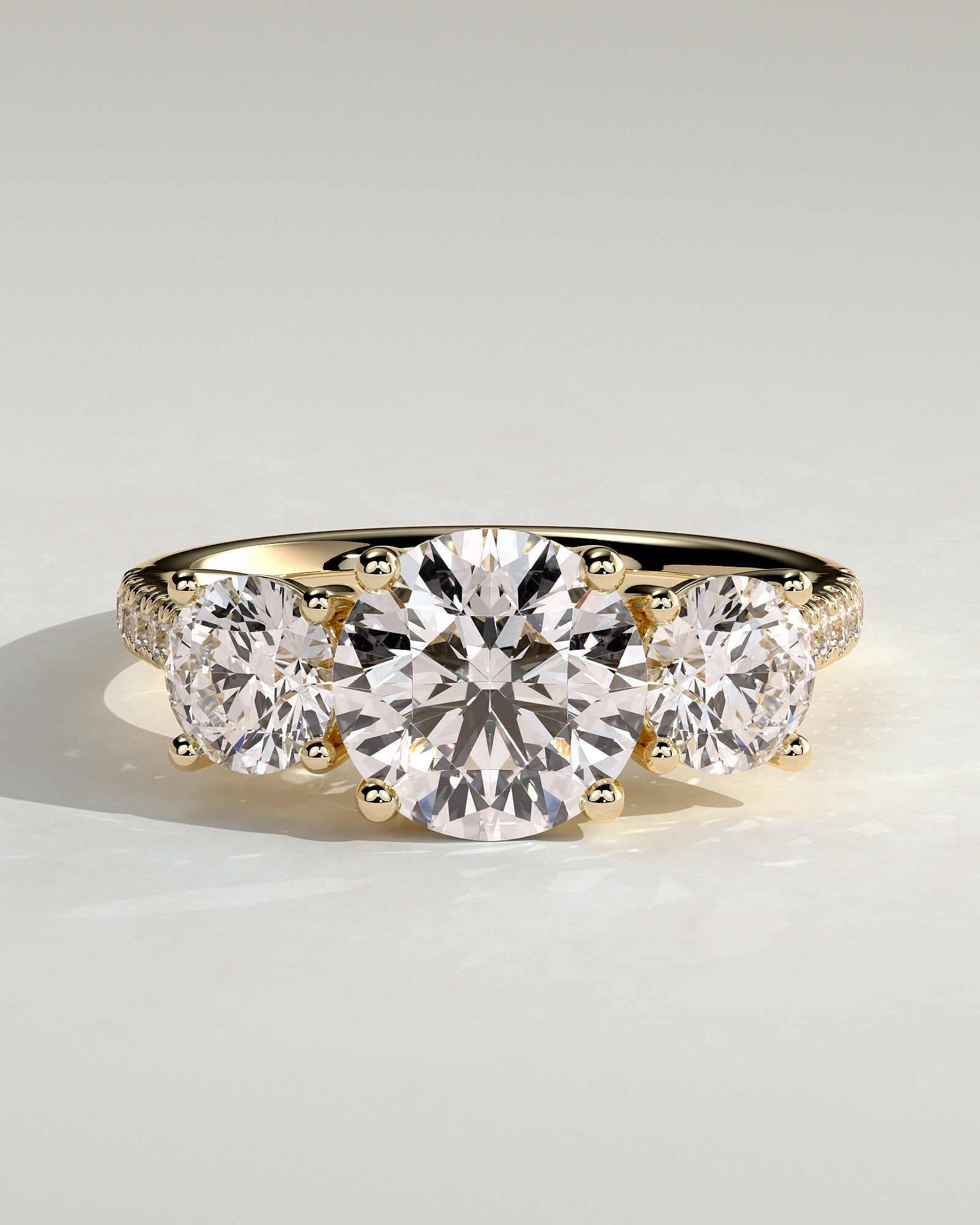 Ella - Round Claw Trilogy with Round Side Stones, Pave Band and Trellis Gallery  Engagement Ring - Yellow Gold - Yellow Gold 2ct