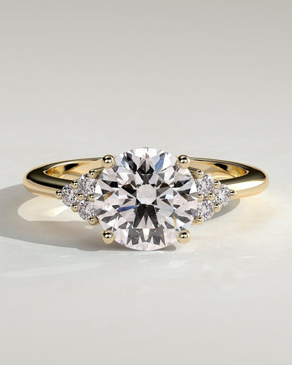 Greta - Round Claw Solitaire with Round Shoulder Stones Engagement Ring - Yellow Gold