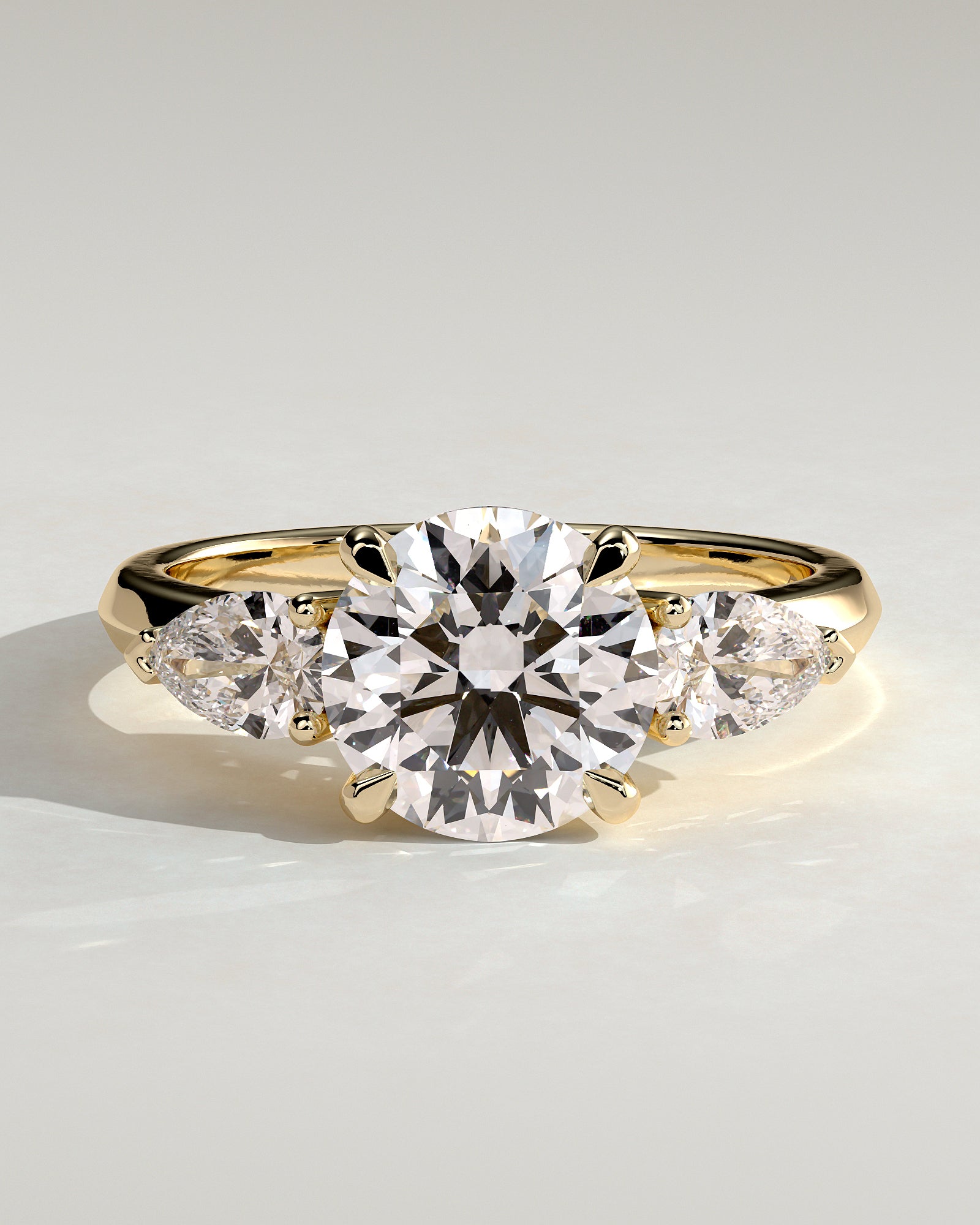 Halle - Round Claw Trilogy with Pear Side Stones and Knife Edge Band Engagement Ring - Yellow Gold - Yellow Gold 2ct