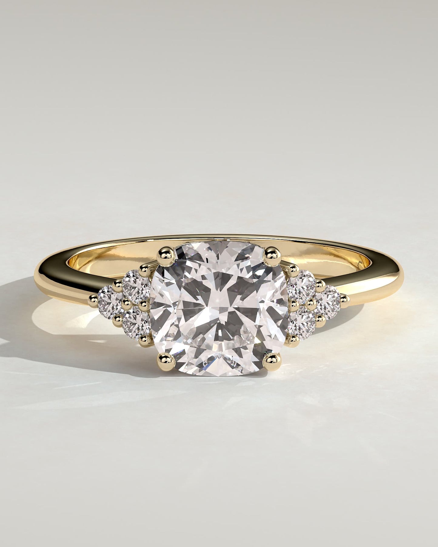 Lena - Cushion Claw Solitaire with Round Shoulder Stones Engagement Ring - Yellow Gold