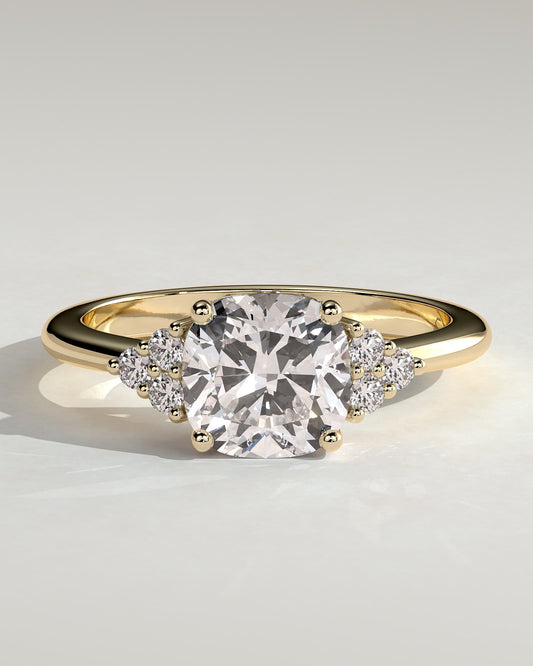 Lena - Cushion Claw Solitaire with Round Shoulder Stones Engagement Ring - Yellow Gold
