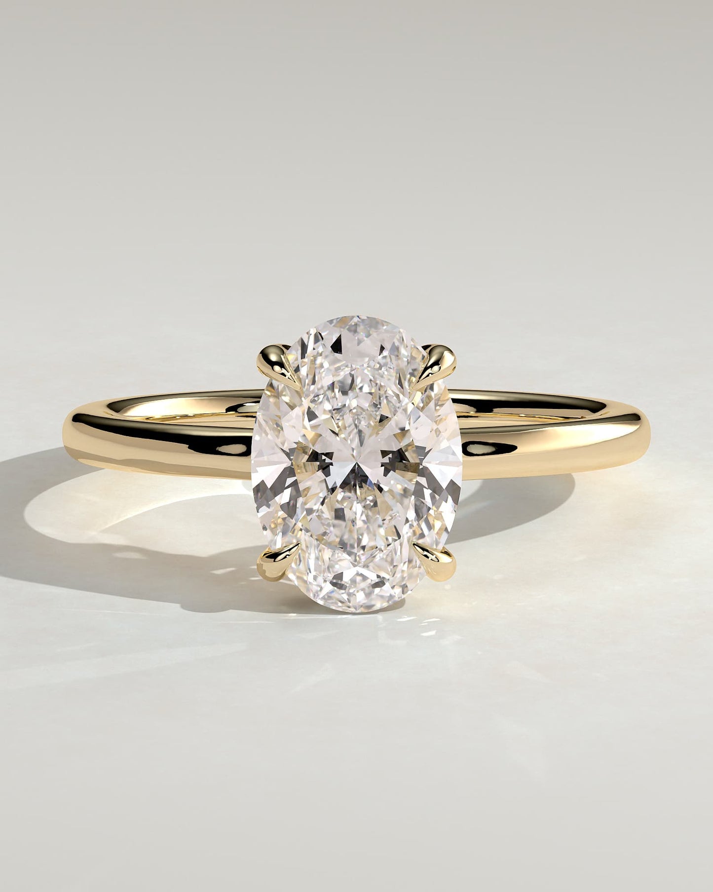 Kiana - Oval Claw Solitaire with Hidden Halo and Floating Cathedral Low Setting Engagement Ring - Yellow Gold
