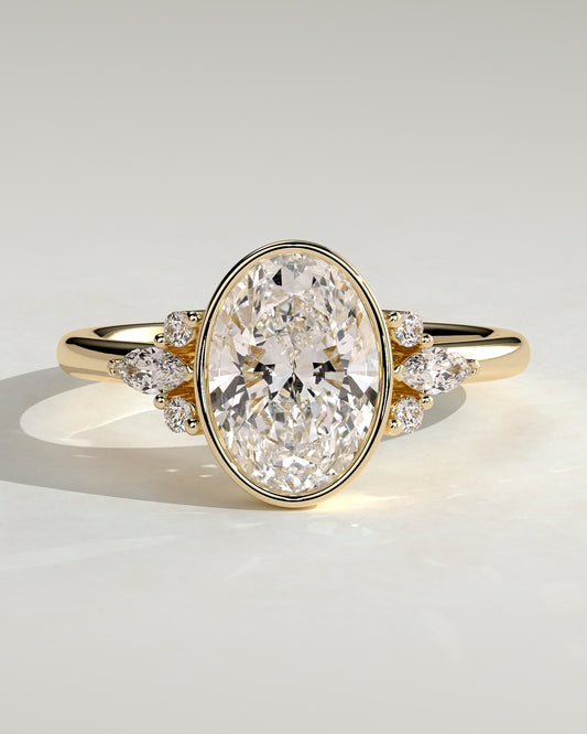 Meesha - Oval Bezel Solitaire with Marquise-Round Shoulder Stones and Cathedral High Setting Engagement Ring - Yellow Gold