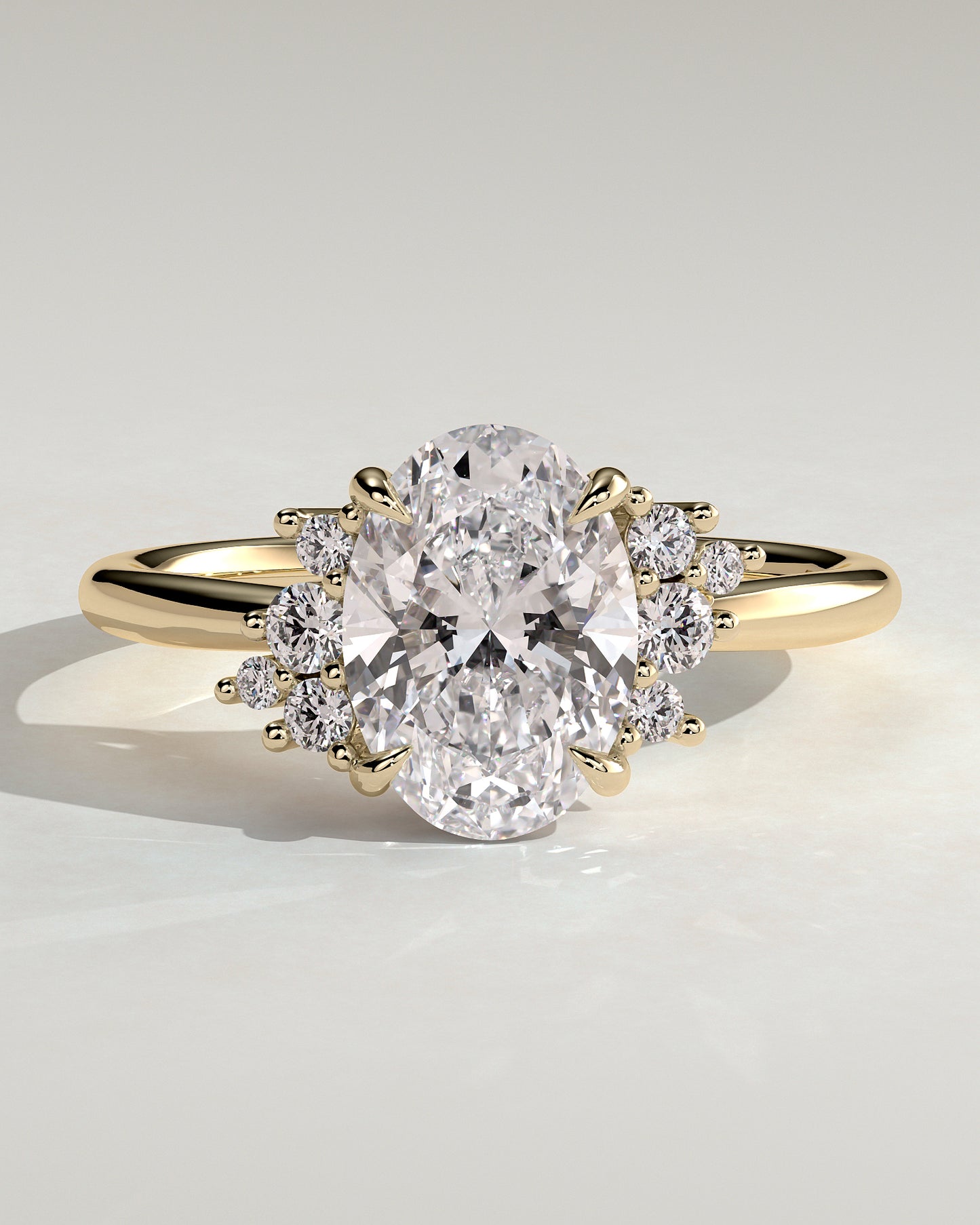 Esther - Oval Claw Solitaire with Clustered Round Opposing Shoulder Stones Engagement Ring - Yellow Gold - Yellow Gold 2ct