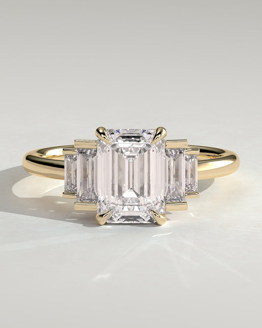 Nina - Emerald Claw Trilogy with Graduating Baguette Shoulder Stones Engagement Ring - Yellow Gold