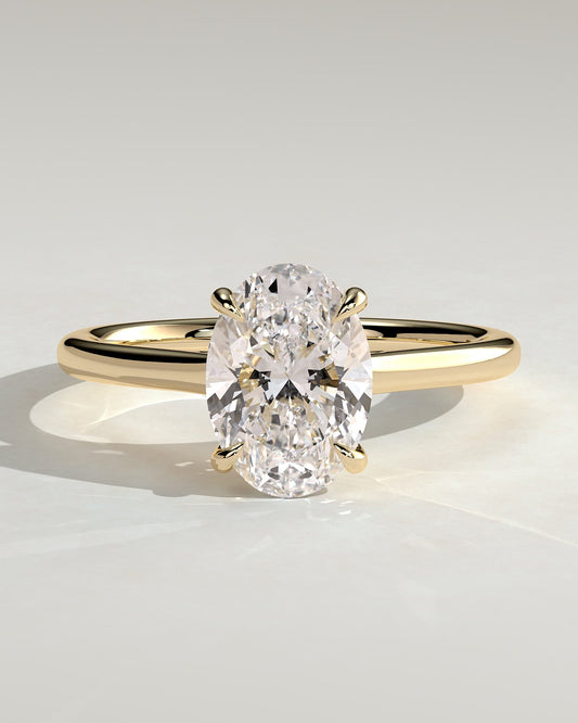 Olivia - Oval Claw Solitaire with Cathedral Low Setting and Open Trellis Gallery Engagement Ring - Yellow Gold