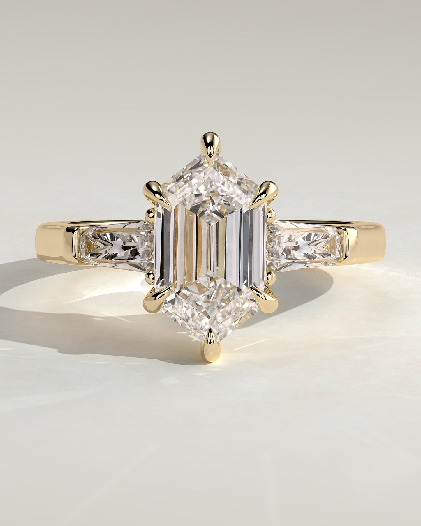 Myrtle - Elongated Hexagon Claw Trilogy with Tapered Baguette Side Stones and Cathedral Setting Engagement Ring - Yellow Gold