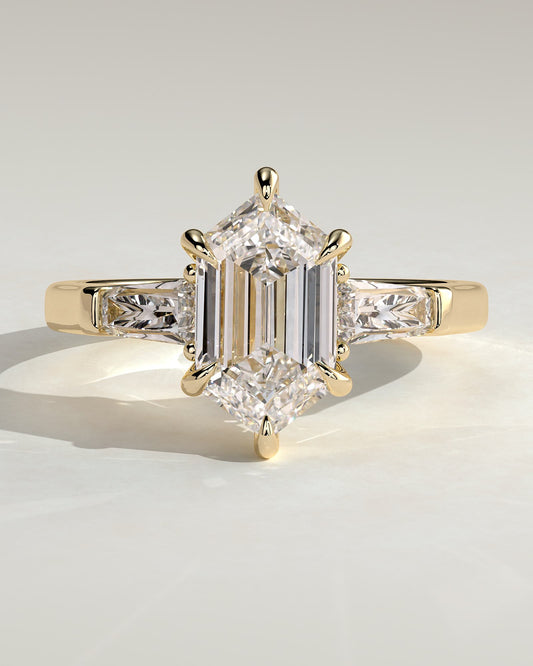 Myrtle - Elongated Hexagon Claw Trilogy with Tapered Baguette Side Stones and Cathedral Setting Engagement Ring - Yellow Gold