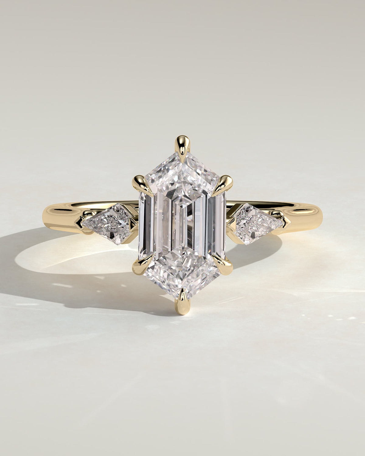 Wanda - Elongated Hexagon Claw Trilogy with Kite Side Stones Engagement Ring - Yellow Gold