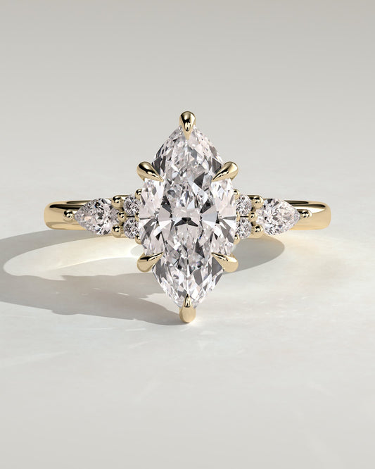 Loretta - Marquise Claw Solitaire with Pear Accents and Round Shoulder Stones Engagement Ring - Yellow Gold