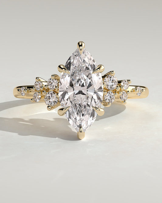 Minnie - Marquise Claw Solitaire with Clustered Round Shoulder Stones Engagement Ring - Yellow Gold