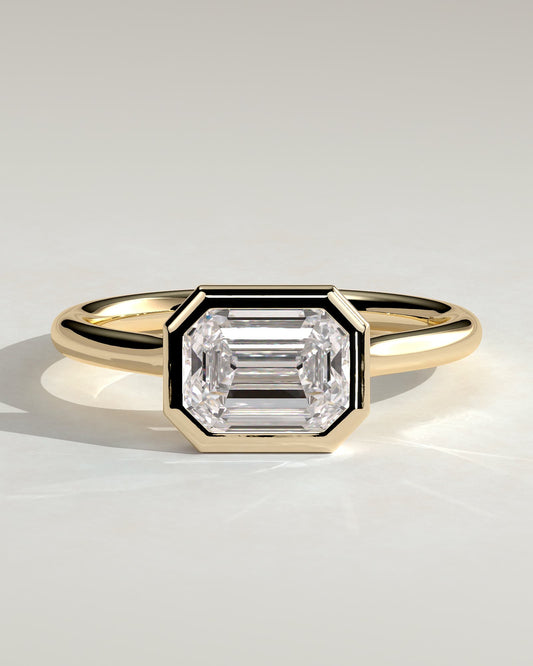 Olive - Statement Emerald East West Bezel Solitaire with Open Cathedral High Setting Engagement Ring - Yellow Gold
