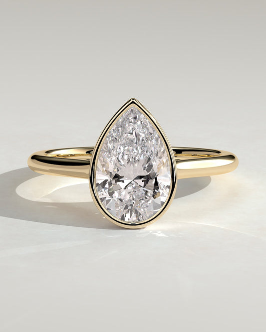 Paris - Pear Bezel Solitaire with Cathedral High Setting Engagement Ring - Yellow Gold