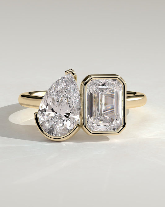 Margot - Pear and Emerald Bezel-and-Half-Bezel Toi et Moi Engagement Ring - Yellow Gold