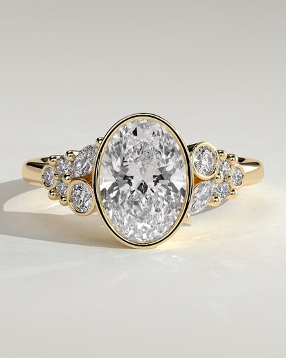 Isabella - Oval Bezel Solitaire with Clustered Round-Marquise Mixed Set Shoulder Stones Engagement Ring - Yellow Gold