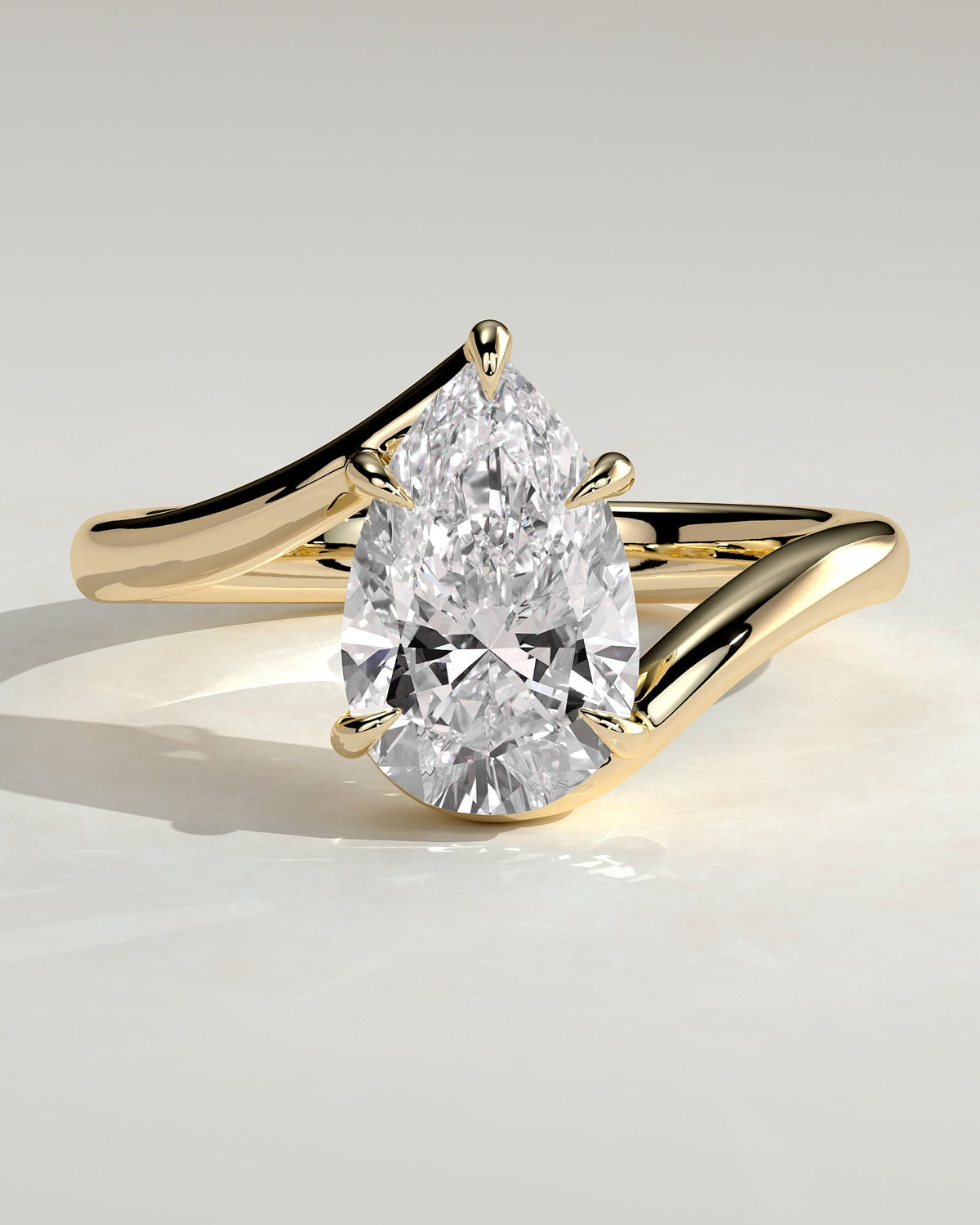 Jennifer - Pear Claw Solitaire with Bypass Band Engagement Ring - Yellow Gold