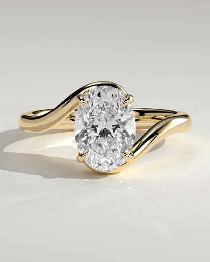 Kala - Oval Claw Solitaire with Bypass Band Engagement Ring - Yellow Gold