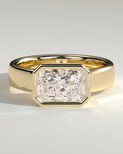 Frankie - Statement Radiant East West Bezel Solitaire with Flat Cigar Band Engagement Ring - Yellow Gold