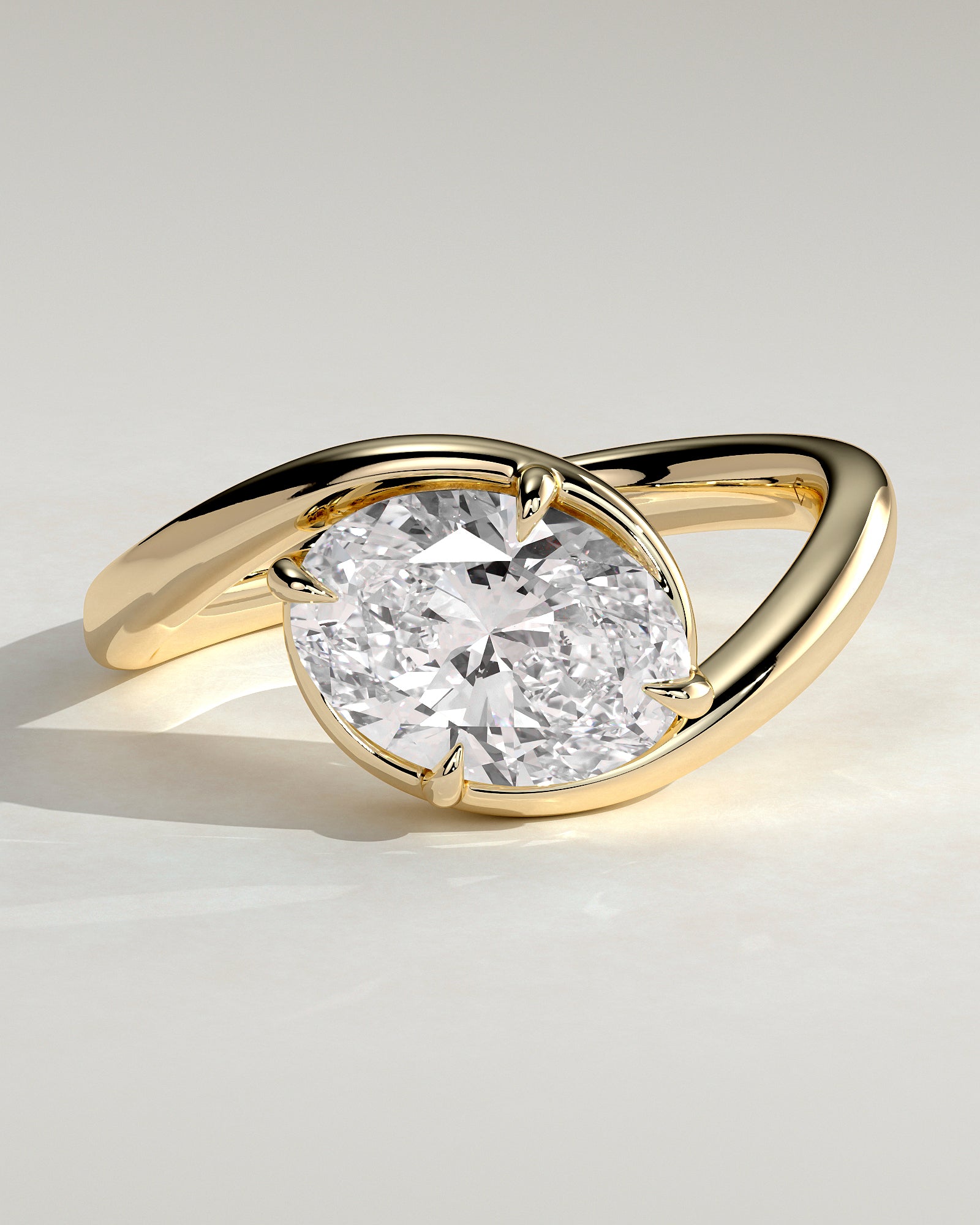 Casey - Oval East West Claw Solitaire with Bypass Band  Engagement Ring - Yellow Gold - Yellow Gold 2ct