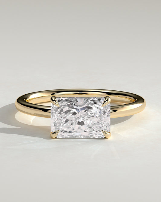 Zara - Radiant East West Claw Solitaire with Raised Basket Gallery Engagement Ring - Yellow Gold - Yellow Gold 2ct