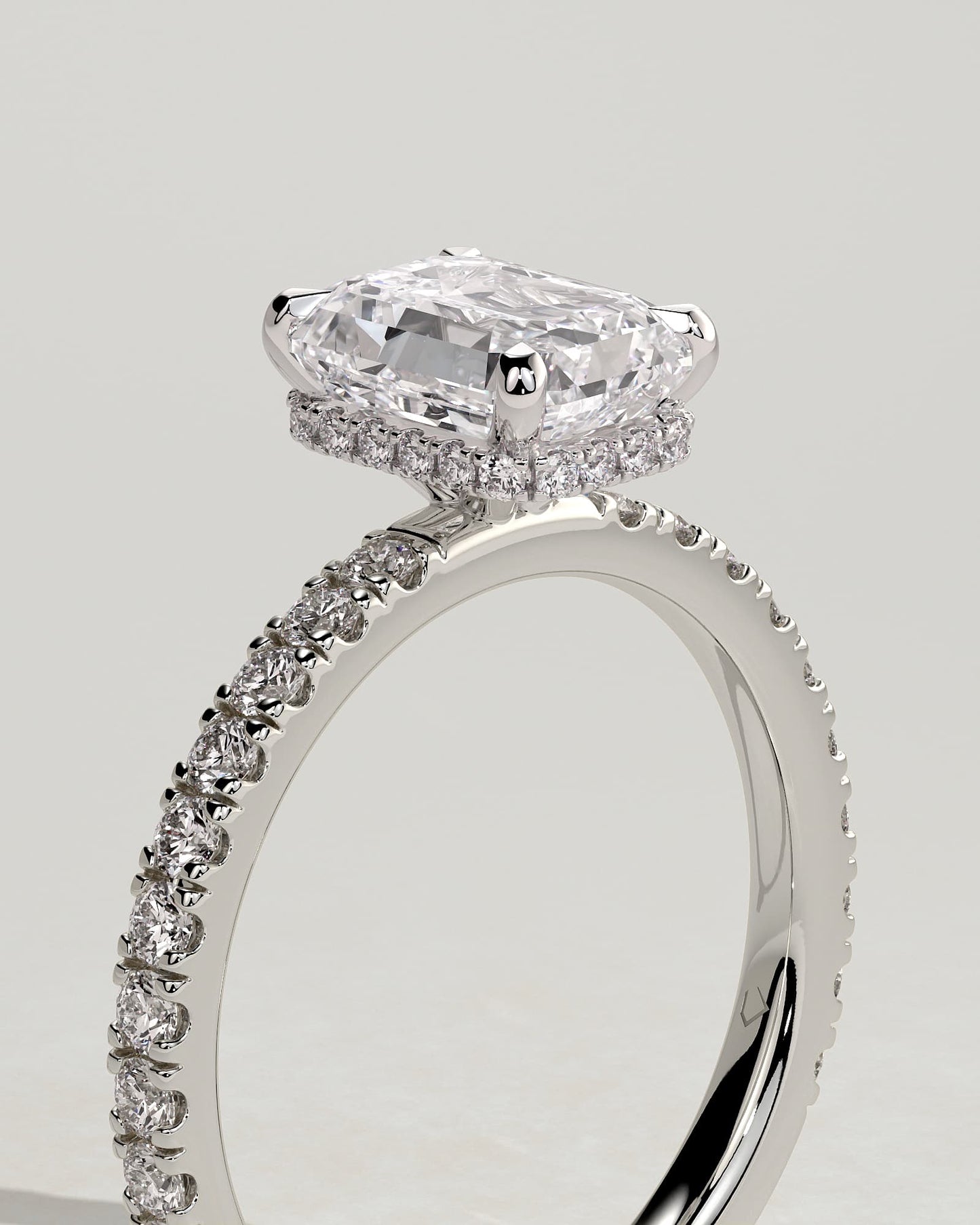 Eliana - Emerald Claw Solitaire with Wrap Around Hidden Halo and Pave Band Engagement Ring - White Gold