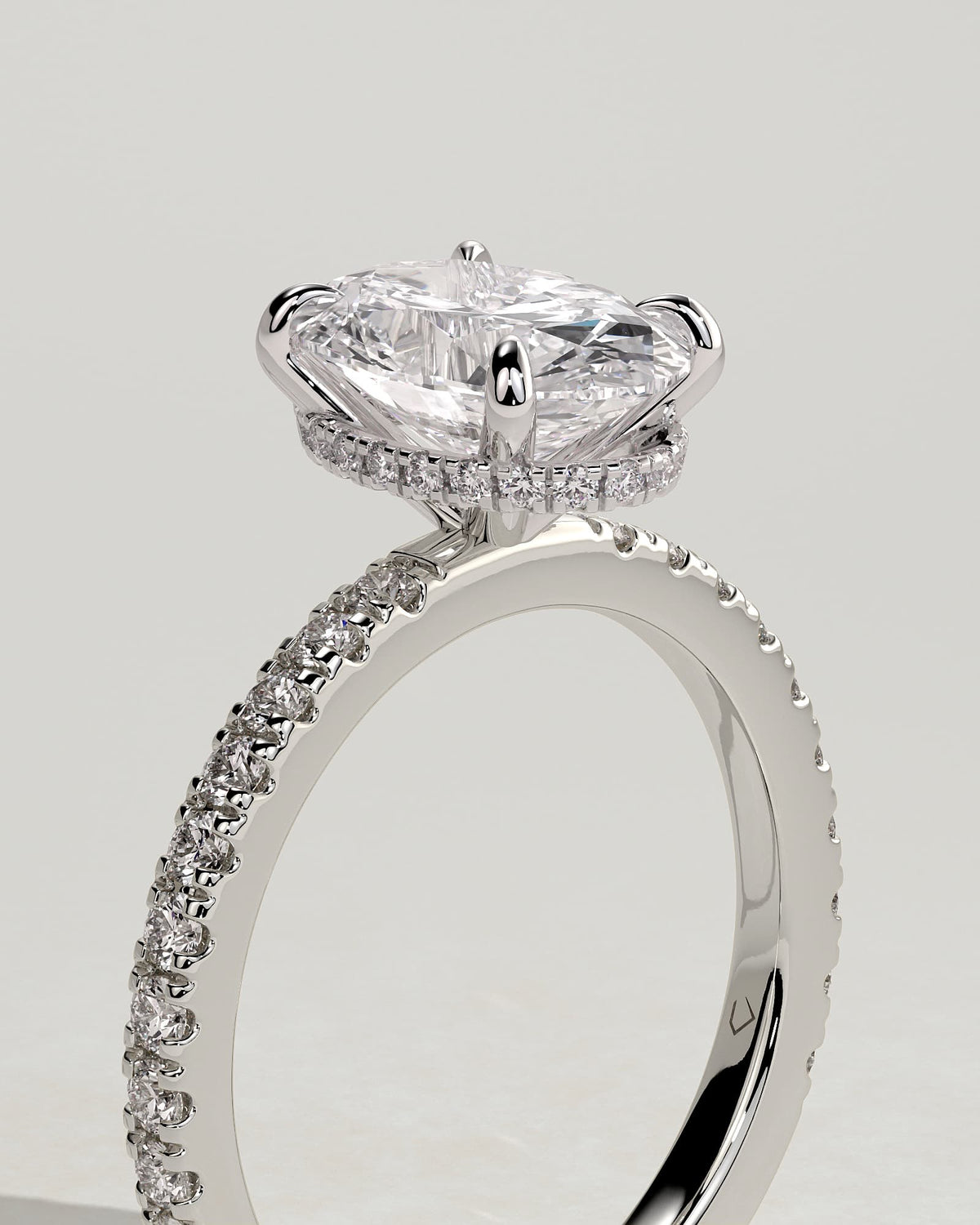 Evangeline - Oval Claw Solitaire with Wrap Around Hidden Halo and Pave Band Engagement Ring - White Gold
