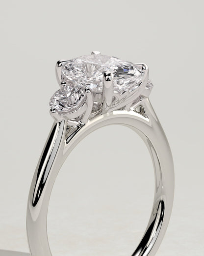 Charmaine - Elongated Cushion Claw Trilogy with Round Side Stones and Lily Detail Engagement Ring - White Gold
