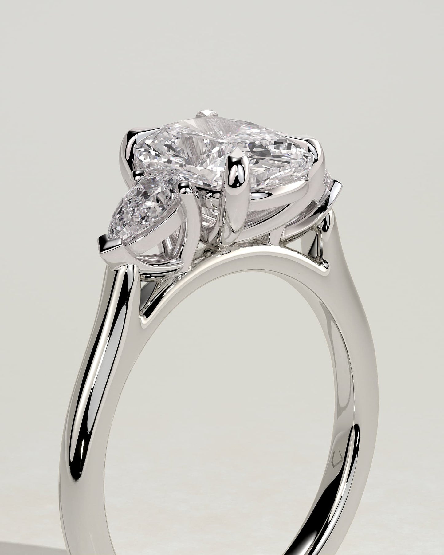 Cataleya - Elongated Cushion Claw Trilogy with Pear Side Stones and Cathedral Setting Engagement Ring - White Gold