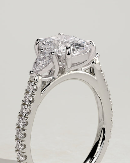 Bree - Elongated Cushion Claw Trilogy with Pear Side Stones and Pave Band Engagement Ring - Platinum