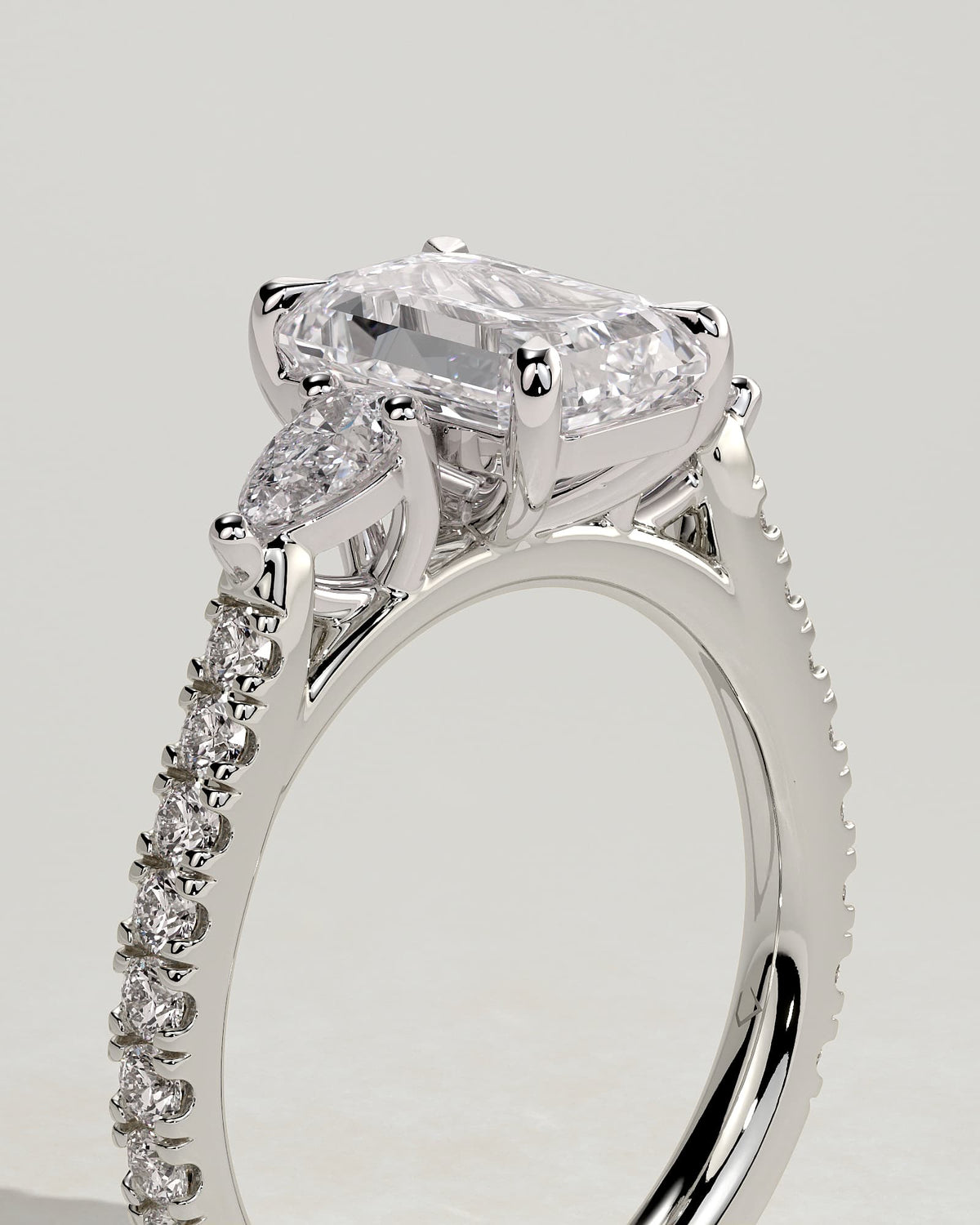 Autumn - Emerald Claw Trilogy with Pear Side Stones and Pave Band Engagement Ring - White Gold