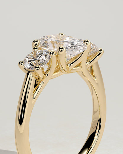 Grace - Oval Claw Trilogy with Round Side Stones, Open Trellis Gallery and Tapered Band Engagement Ring - Yellow Gold